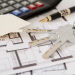 keys-fountain-pen-house-paper-cut-out-calculator-architectural-blueprints